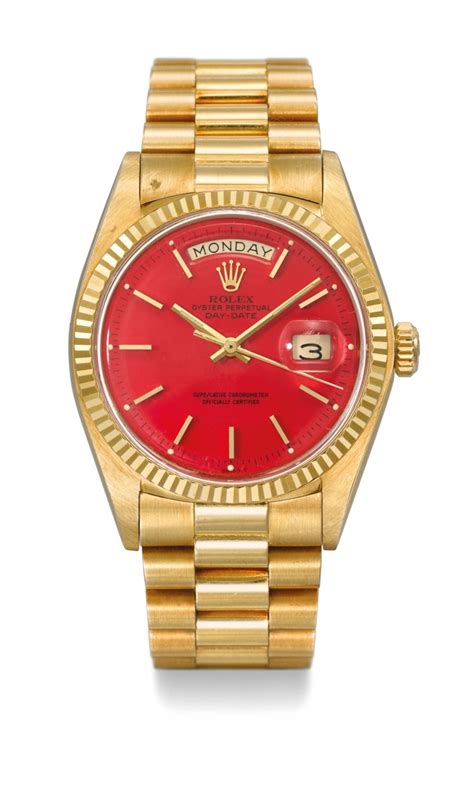 gold and red rolex